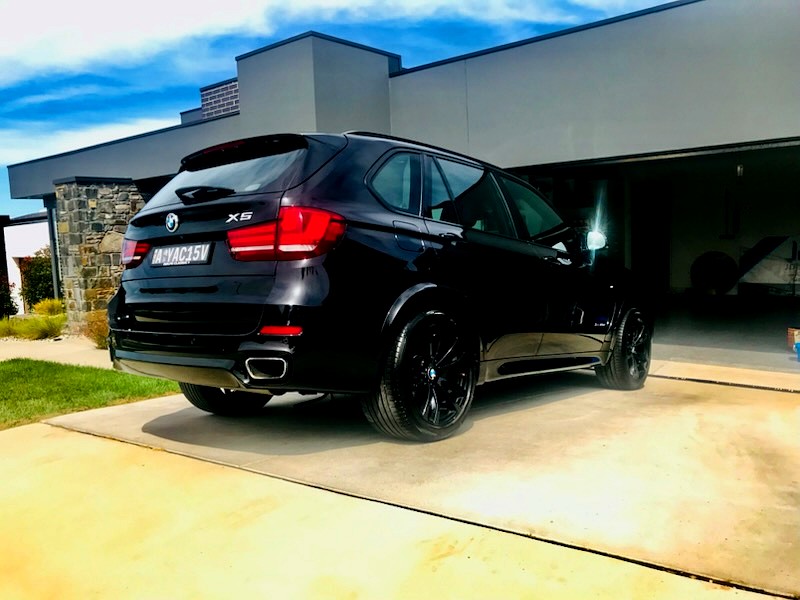 Black BMW X5 with glossy ceramic coating finish — Shine Your Ride, Canberra